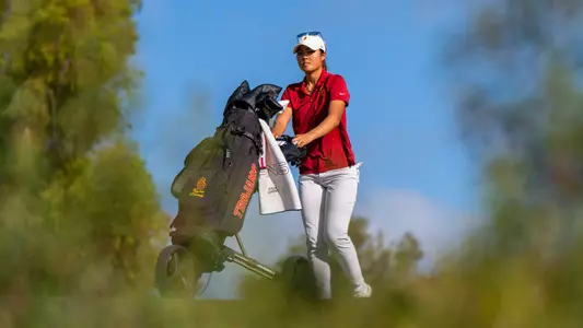 Kylie Chong pushes her cart at the GameAbove Invitational