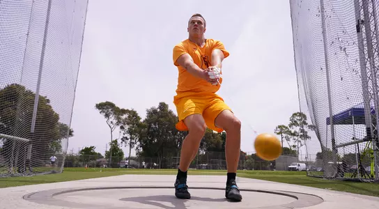 Mico Lampinen throwing hammer at UCLA Dual Meet