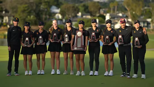 The USC women's golf team poses together with the runner-up trophies after the 2026 NCAA Championships