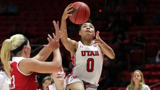 Kiana Moore drives to the basket.