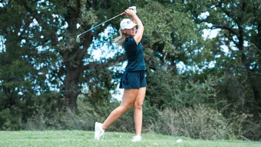 Kylie Ruston tees off during a qualifying round.