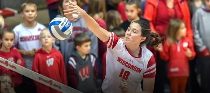 Danielle Hart attacks the ball at the net.