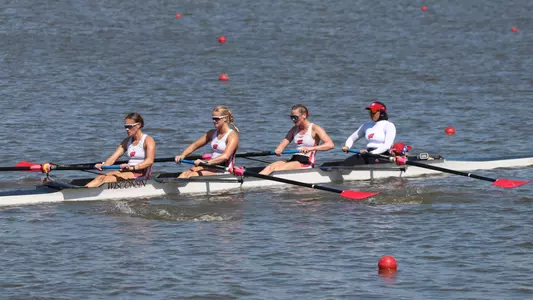 The Wisconsin women's rowing team competes in an openweight fours race. 