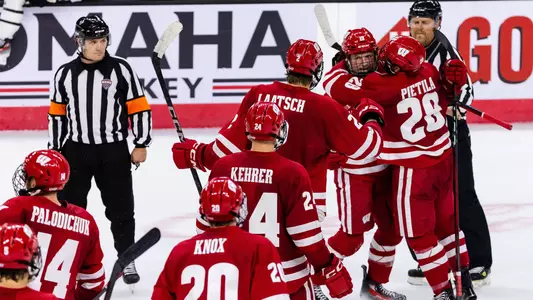 Wisconsin men's hockey team celebrates winning its exhibition game at Omaha