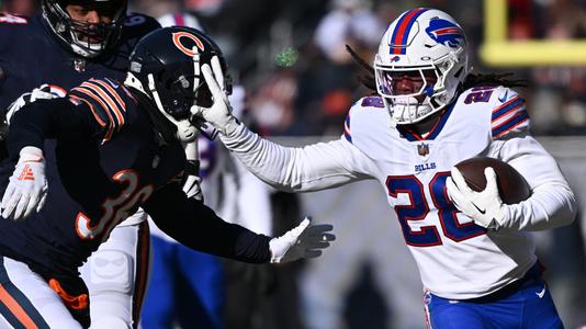 Buffalo Bills running back James Cook (28) rushes in the first