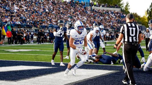 December 22, 2022: Air Force Falcons quarterback Haaziq Daniels #4 and Air  Force Falcons running back Brad Roberts #20 talking to the ESPN announcer  about the amazing performance during the Lockheed Martin