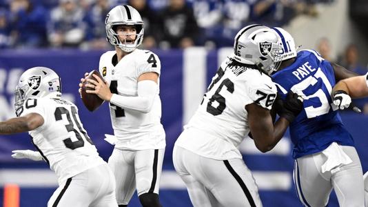 Carr, Raiders beat Colts 23-20 to close in on playoff spot