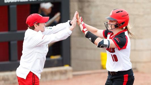 Louisville's Drew Campbell, right, celebrates with Alex Binelas