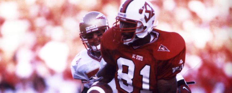 Former NC State, NFL star receiver Torry Holt named to College Football  Hall of Fame