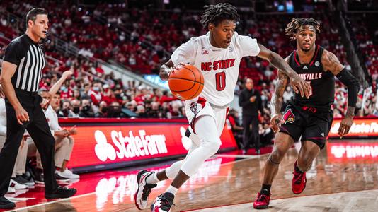 North Carolina State's Jack Clark (5) drives past Austin Peay's