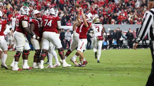 Louisville football players hold camp at King Louie's Sports Complex