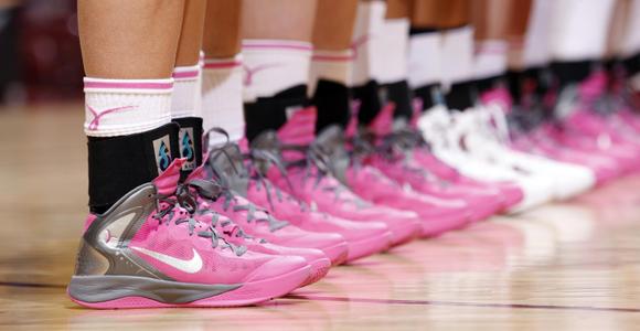 Michigan wearing Breast Cancer Awareness gear against Illinois 