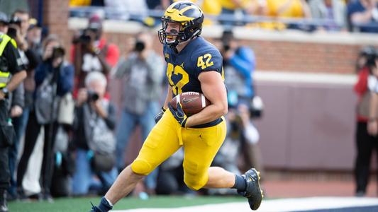 game used/authentic University of Michigan football jersey