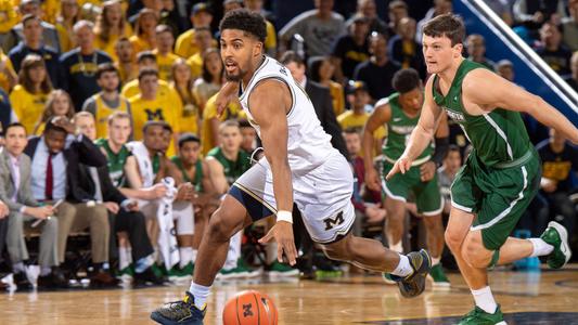 UC Bearcats basketball player David DeJulius donating proceeds