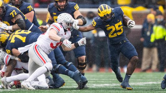 New England Patriots guard Mike Onwenu (71) blocks during an NFL