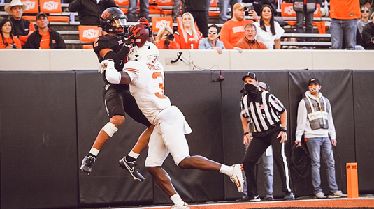 No. 11 Oklahoma State scores late touchdown for win over No. 20 Texas