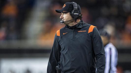 Where does Oregon State coach Jonathan Smith rank in covering the point  spread? 