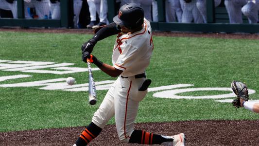 Baseball Player Hitting by CSA Images