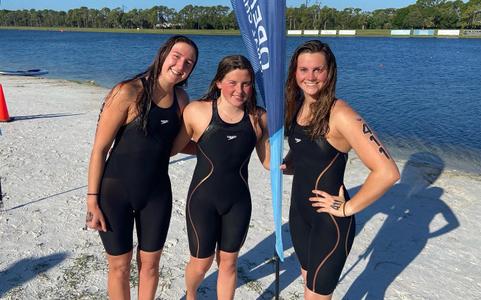Rice distance swimmers (from left to right) Ella Dyson, Amelia Kane and Shannon Campbell pose for a photo after competing at the Open Water Nationals in April of 2023