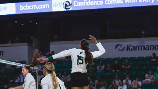 Ava Siefke attacks in an exhibition against Michigan State