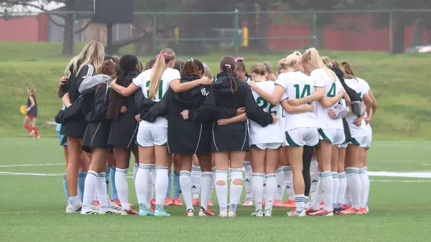 Soccer Team Huddle vs. Miami, Oct. 11, 2026