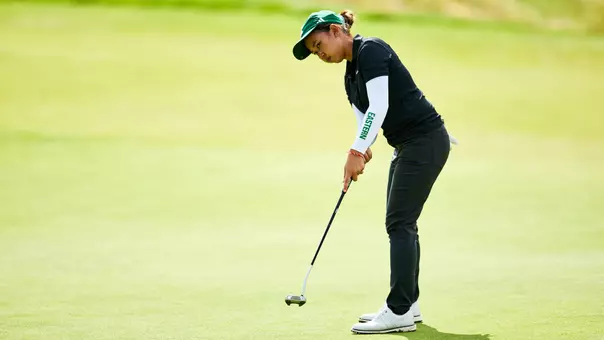 Baiyok Sukterm watches a putt roll toward the hole at the Leadership & Golf Invitational at Chambers Bay in University Place, Wash.