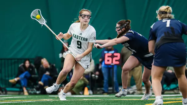 Kelsea Dague carries the ball toward the cage at home against Butler, Feb. 8, 2026.
