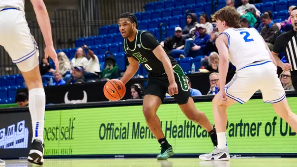 Gregory Lawson II dribbling a basketball against Buffalo, March 3, 2026