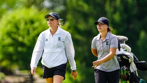 Caterina Don, left, walks down the fairway at the 2026 MAC Championships with MAC All-Tournament player Savannah de Bock