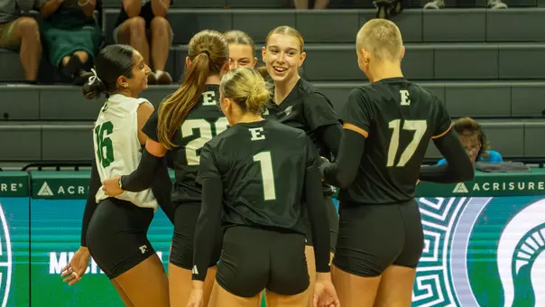 Maddie Herman celebrates with the Eastern Michigan volleyball team at an exhibition match against Michigan State Aug. 19, 2026