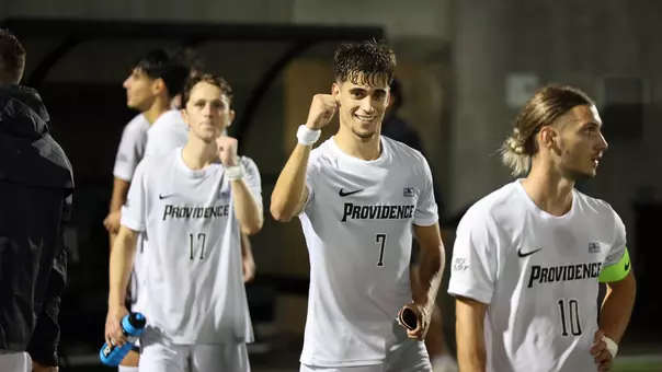 Mitchel Varley and Bruno Rosa celebrate after a win against Boston College