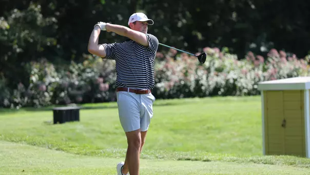 Men's golf player Kevin Legnard hitting a drive off the tee