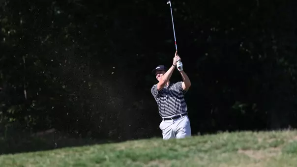 Men's golf player Logan Jaeger hitting his tee shot