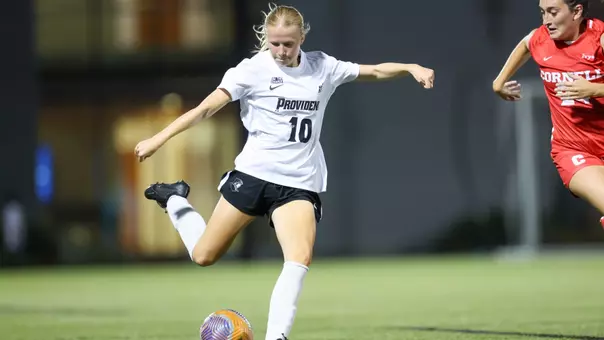 Women's soccer player Isabella Kloock-Jensen kicks ball versus Cornell on Chapey Field at Anderson Stadium on September 11, 2025