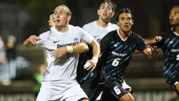 Charlie Dickerson goes in for a header against Bryant at home on Sept. 13, 2025.