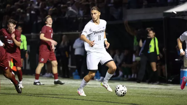 Diego Batista dribbles the ball down field vs BC in Providence, RI