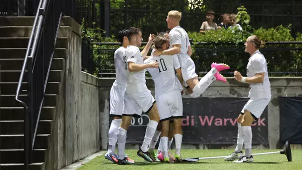 Men's Soccer celebrates a goal Against BC on August 29, 2025.