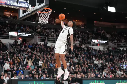 Jamier Jones dunks the ball on the fast break versus Creighton at the Amica Mutual Pavilion.