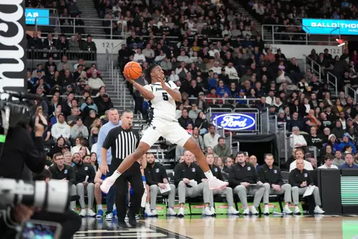 Jamier Jones saves the ball on the baseline versus Creighton at the Amica Mutual Pavilion.