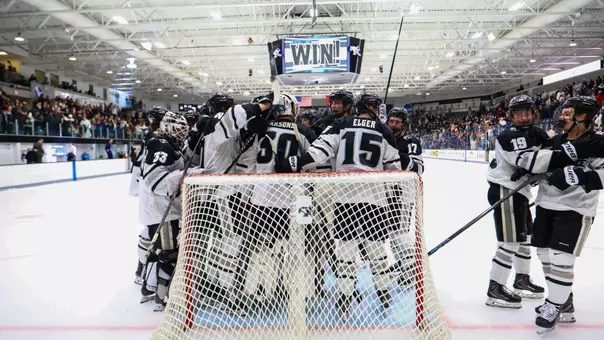 Men's Hockey Team Celebrates win over Boston College at Schneider Arena