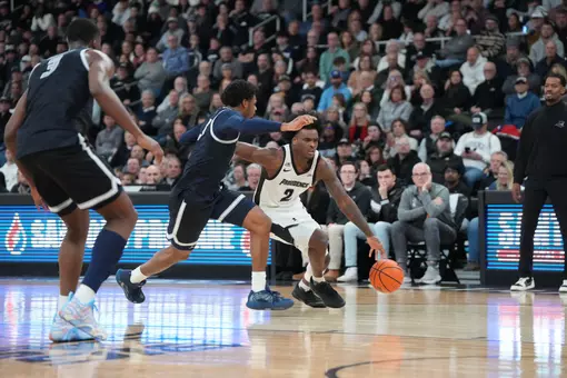 Jaylin Sellers drives to the paint versus Georgetown at the Amica Mutual Pavilion.