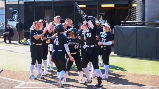 Softball Team Celebration after Zoe Krizan's walk-off home run against Stonehill at Glay Field