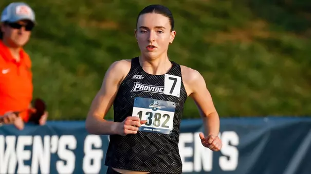 Women's track runner Maeve O'Neill running the 800 meters at the NCAA First Round