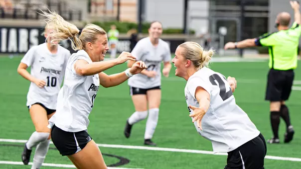 Carolyn Hinkle and Signe Tingager Celebrating Goal WSOC vs Monmouth