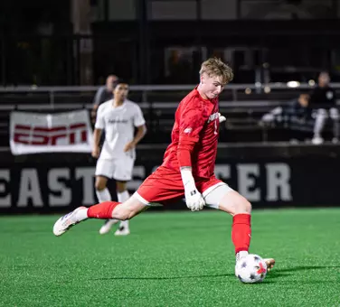 Ryan Carney kicking the ball