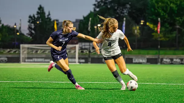 Kaitlyn Brady dribbling ball vs Maine