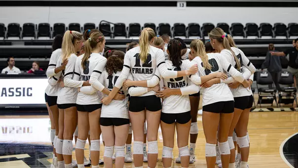 Team Huddle Against Manhattan in the Friar Classic