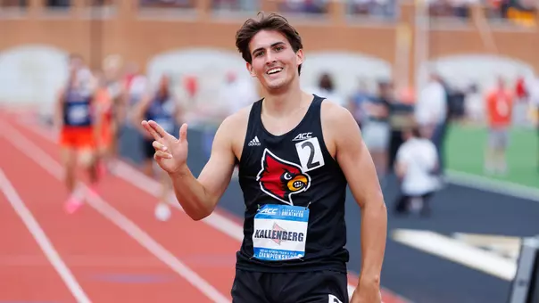 Paul Kallenberg throws the L up after winning the ACC decathlon title