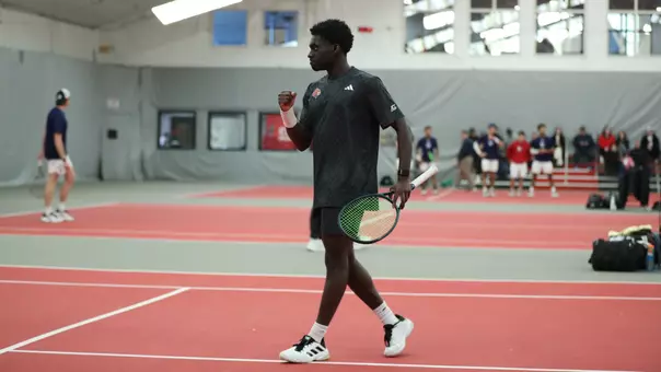 Russell Lokko celebrating