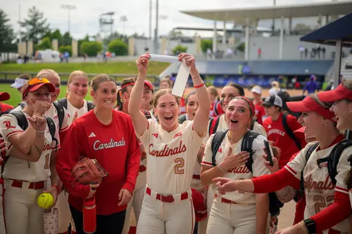 Madison Pickens and team slap bracket after Walk Off win